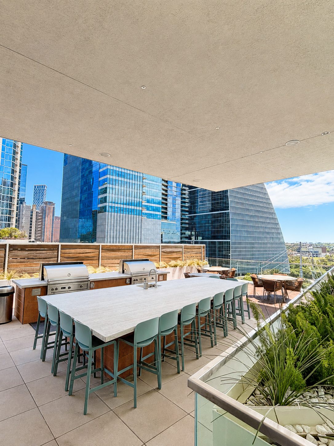 The Independent — rooftop outdoor kitchen, downtown Austin skyline