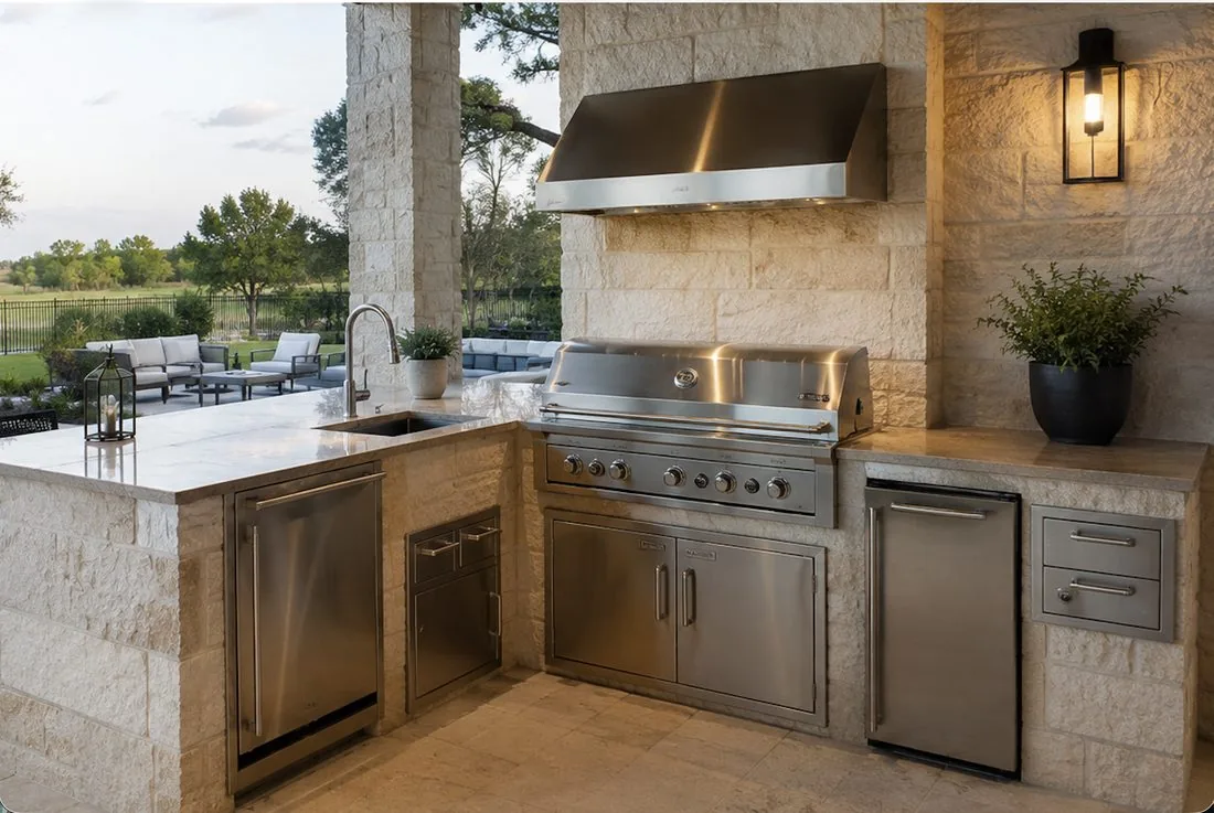 Custom limestone outdoor kitchen with premium appliances